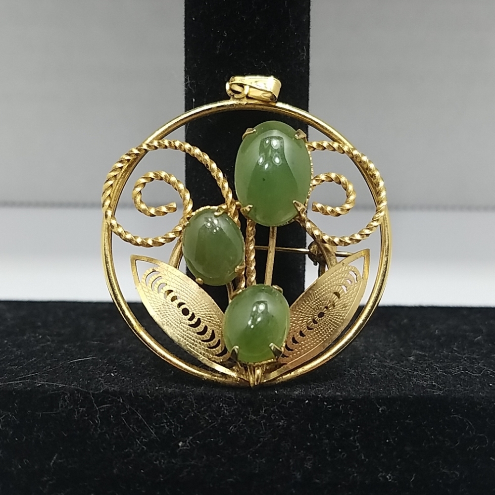 Gold tone brooch or pendant